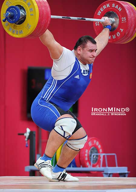 The go-ahead lift: turned out that this 209-kg snatch gave Ruslan Albegov the margin he needed for victory over a hard charging Bahador Moulaei.  Albegov got the weight overhead strongly, but then had to take two quick steps forward to save the lift as he stood up.  IronMind&reg; | Randall J. Strossen photo