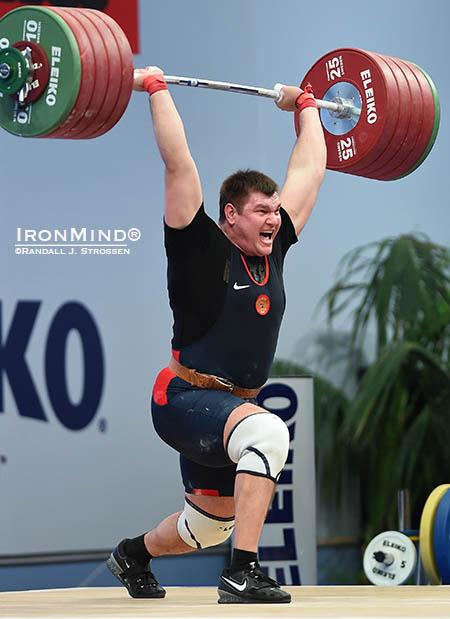 Russia’s Aleksei Lovchev put an exclamation point at the end of the 2014 European Weightlifting Championships: he added this 252-kg clean and jerk to the 205-kg snatch he had already posted to tell the world that he’s a player for top honors in the +105 kg category. IronMind® | Randall J. Strossen photo Russia’s Aleksei Lovchev put an exclamation point at the end of the 2014 European Weightlifting Championships: he added this 252-kg clean and jerk to the 205-kg snatch he had already posted to tell the world that he’s a player for top honors in the +105 kg category. IronMind® | Randall J. Strossen photo
