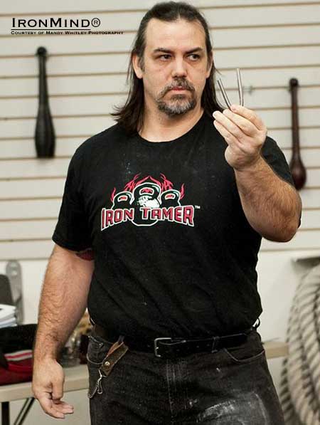 43-year old David Whitley has just been certified on the IronMind Red Nail, a world standard steel bend and a fitting accomplishment for a performing strongman. IronMind® | Image courtesy of Mandy Whitley Photography 43-year old David Whitley has just been certified on the IronMind Red Nail, a world standard steel bend and a fitting accomplishment for a performing strongman. IronMind® | Image courtesy of Mandy Whitley Photography