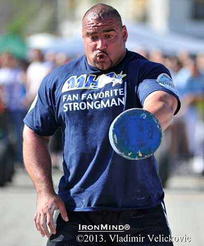 Ervin Katona, wearing the Fan Favorite shirt at the MHP Strongman Champions League Serbia on the 25-kg weight for height.  IronMind&reg; | Vladimir Velickovic photo.  