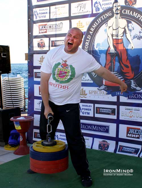 Igor Kupinsky succeeded with 136.5 kg on the Rolling Thunder to defend his title as the World Armlifting Champion. IronMind® | Photo courtesy of Andrey Sharkov/WAA.