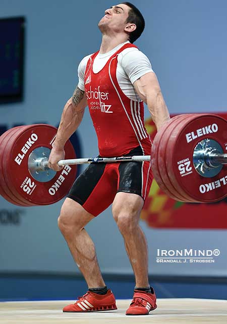 Ivan Markov (Bulgaria) is about to flip the switch and explode on this 175-kg snatch as he delivered a world class performance in the 85-kg class at the 2014 European Weightlifting Championships in Tel Aviv.  IronMind&reg; | Randall J. Strossen photo