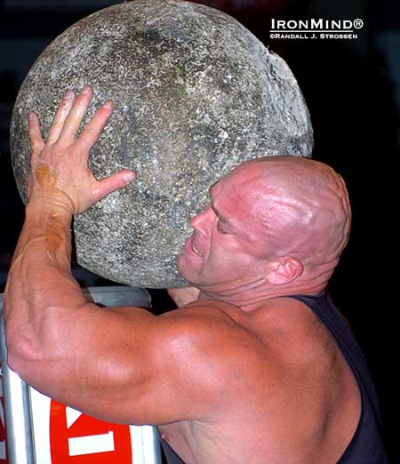 The Jon Andersen might be best known as a professional wrestler, but he was a formidable strongman competitor, too, and his trademark skull was the envy of shar peis worldwide, especially as it struck fear in the heart of big stones.  Here, Jon unloads on  the Atlas Stones at the 2004 World Muscle Power Championships, where he competed in a world class field that included  Zydrunas Savickas, Magnus Samuelsson, Mariusz Pudzianowski, Vasyl Virastyuk, Raimonds Bergmanis, Jessen Paulin, Mark Philippi, Rene Minkwitz, Dominic Filiou, Geoffrey Dolan and Hugo Girard.  IronMind&reg; | Randall J. Strossen photo.