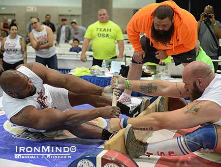 Powered by dotFit, mas wrestling is headed to the Midwest: Mark Felix (left) and Clay Edgin (right) are among the big boys who will plant their feet, grab the still and try to pull the other other guy over the centerboard or rip the stick out of his hands.  IronMind&reg; | Randall J. Strossen photo