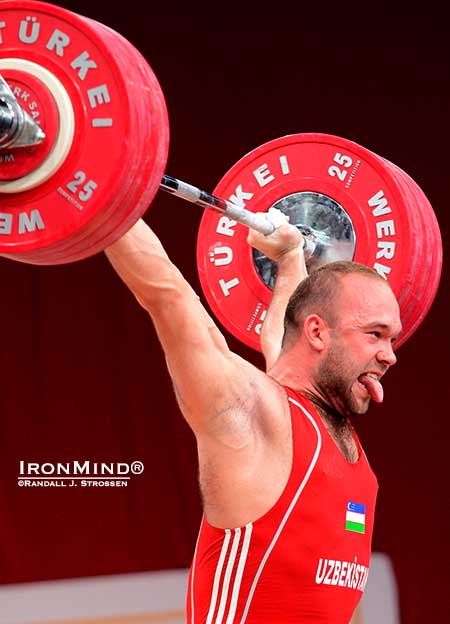 It&rsquo;s his trademark: Ruslan Nurudinov celebrates his successful 190-kg gold medal snatch by sticking out his tongue.  IronMind&reg; | Randall J. Strossen photo
