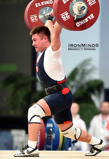 Oleg Chen (Russia) jerked 176 kg to complete his gold medal sweep in the men’s 69-kg class. IronMind® | Randall J. Strossen photo
Oleg Chen (Russia) jerked 176 kg to complete his gold medal sweep in the men’s 69-kg class. IronMind® | Randall J. Strossen photo