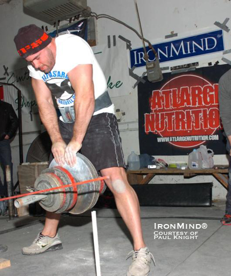 “This photo was taken during a grip contest at Metroflex gym in Arlington, Texas,” Paul Knight explained. “In this picture I was pinching 214.8 lb. on David Horne’s Euro pinch device which was the two-hand pinching event in the contest along with grippers, bending, the IronMind Apollon’s Axle deadlift and a medley. I placed 2nd to Jedd Johnson, a grip monster who is also certified on the CoC #3 and Ironmind Rednail. This contest was sponsored by Ironmind. Thanks Randall for helping out with the contest.” IronMind® | Photo courtesy of Joe Musselwhite. “This photo was taken during a grip contest at Metroflex gym in Arlington, Texas,” Paul Knight explained. “In this picture I was pinching 214.8 lb. on David Horne’s Euro pinch device which was the two hand pinching event in the contest along with grippers, bending, the IronMind Apollon’s Axle deadlift and a medley. I placed 2nd to Jedd Johnson, a grip monster who is also certified on the CoC #3 and Ironmind Rednail. This contest was sponsored by Ironmind. Thanks Randall for helping out w/the contest.” IronMind® | Photo courtesy of Joe Musselwhite.