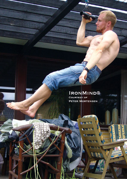 Peter Mortensen, a rock climber from Denmark, does a one-arm pull-up on a Rolling Thunder&reg; Revolving Deadlift Handle:  &ldquo;There seems to be a strong correlation between strength on revolving handles or dumbbells (especially thick handles) and climbing hand strength . . .,&rdquo; Peter told us.  Reprinted from the 2009 IronMind&reg; catalog - Volume Eighteen, with permission.  IronMind&reg; | Photo courtesy of Peter Mortensen.