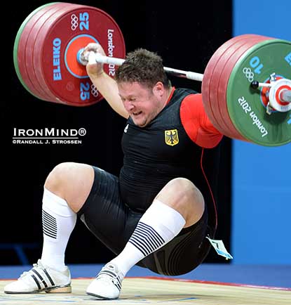 In a devastating hit, Matthias Steiner was clocked in the back of the neck when he missed this 196-kg snatch at the London Olympics.  IronMind&reg; | Randall J. Strossen photo.