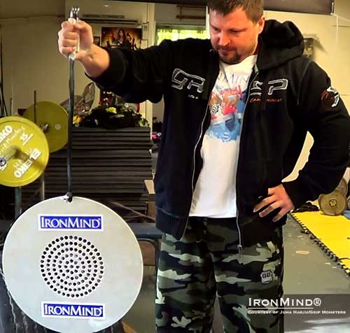 Alexey “Tank” Tyukalov destroyed the men’s world record in the CoC Silver Bullet Hold today with a huge time of 52.49 seconds. For men, the challenge is to use a No. 3 Captains of Crush gripper to hold a CoC Silver Bullet with 2.5 kg hanging from it for as long a possible. IronMind® | Photo courtesy of Juha Harju/Gripmonsters. Alexey “Tank” Tyukalov destroyed the men’s world record in the CoC Silver Bullet Hold today with a huge time of 52.49 seconds. For men, the challenge is to use a No. 3 Captains of Crush gripper to hold a CoC Silver Bullet with 2.5 kg hanging from it for as long a possible. IronMind® | Photo courtesy of Juha Harju/Gripmonsters.
