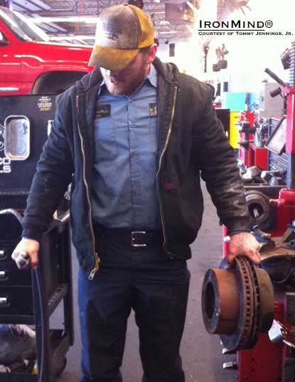 This picture shows  6-ft. tall, 209-lb. Tommy Jennings, Jr. &ldquo;closing a [CoC] #3 and pinch gripping 2 truck rotors together with greasy hands.&rdquo;  Why do we think Joe Kinney would like this guy?  IronMind&reg; | Photo courtesy of Tommy Jennings, Jr.