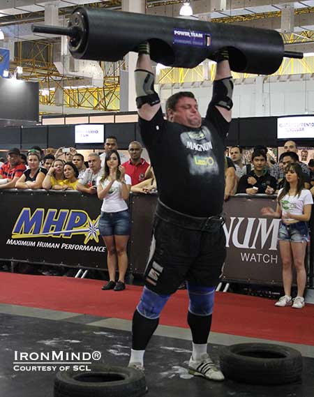 Zydrunas Savickas on the Log Lift for reps at the MHP Strongman Champions League competition held at the Expo Nutrition in Sao Paulo, Brazil.  IronMind&reg; | Image courtesy of SCL