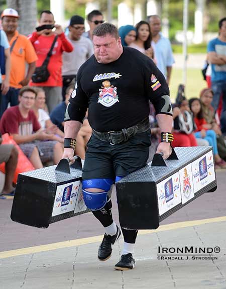 Zydrunas Savickas, the defending SCL world champion, capped off a strong first day of competition with a win in the Farmer&rsquo;s Walk, and he goes into tomorrow as the leader.  IronMind&reg; | Randall J. Strossen photo